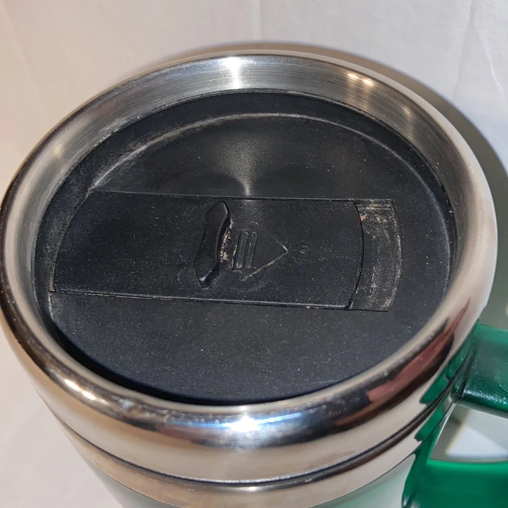 Green Grumpy coffee tumbler in perfect condition!